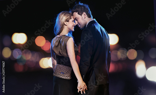 Plakat na zamówienie Conceptual portrait of a young couple in elegant evening dresses