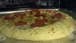 pizza cooking inside the oven
