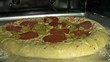 pizza cooking inside the oven
