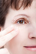 © ia_64 - Women applying eye skin cream