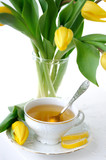 Fototapeta Tulipany - Yellow tulips and tea