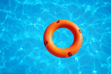 Orange Life Buoy  On Water