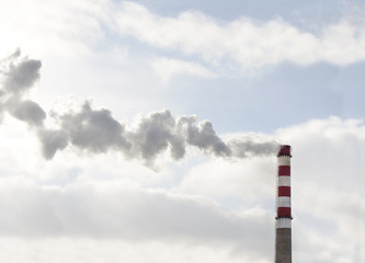 Factory pipe, emitting a cloud of white smoke