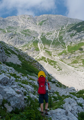 Wall Mural - mother carrying baby in alps