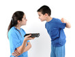 © uwimages - Brother and sister fighting over the TV remote control isolated.
