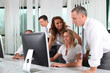 © goodluz - Group of business people working in the office