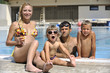 © .shock - happy young family have fun on swimming pool