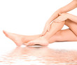 woman massage feet in water isolated on white background