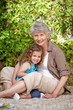© WavebreakMediaMicro - Grandmother with her granddaughter in the garden