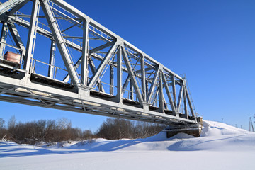 Wall Mural - railway bridge through freeze river