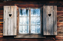 Old Window Shutters In  Wooden Wall
