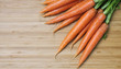 fresh carrots on wood