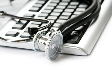 Stethoscope and keyboard illustrating concept of digital securit