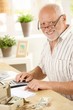© nyul - Portrait of senior man working at home