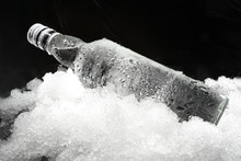 Close Up View Of The Bottle In Ice