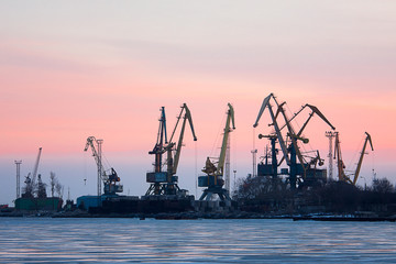  View on seaport with cranes
