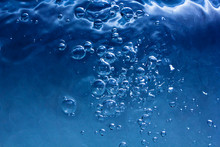 Blue Water With Bubbles And Blue Drops Background