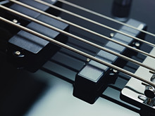 Detail Of Electric Bass, Pickups And Cords
