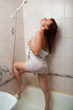 sexy young red-haired woman in shower