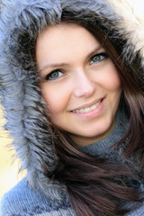 Wall Mural - Portrait of a young smiling woman