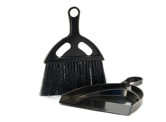 black brush and dustpan