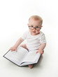 © blessings - Baby reading with glasses