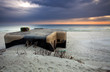 Bunker on beach in sunrise