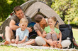 © WavebreakMediaMicro - Family camping in the park