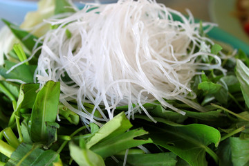 Wall Mural - Vermicelli and green vegetables