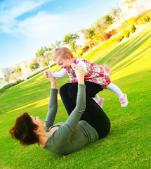 Wall Mural - Mather & baby daughter playing