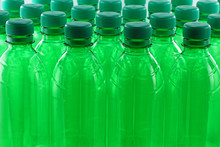 Green Plastic Bottles In A Row