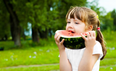 girl eating watermelon