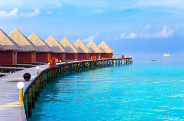 Wall Mural - Maldives. A wooden road over ocean