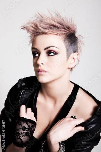 Fototapeta na wymiar Young Female Punk with Pink Hair