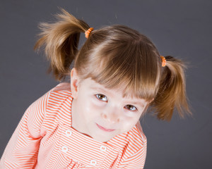 Portrait of the small smiling girl