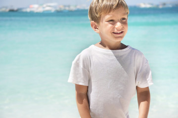 happy boy on sea background