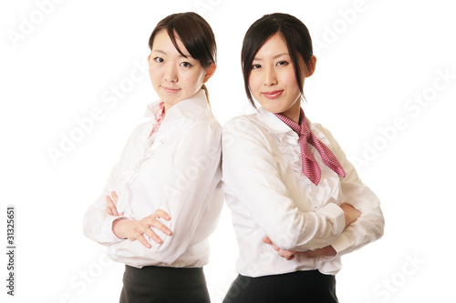 腕組みをした女性二人 Stock Photo Adobe Stock