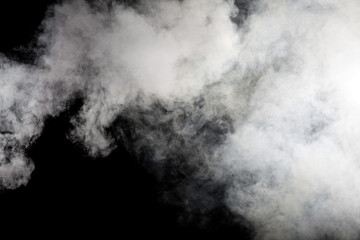 Wall Mural - White smoke on black background. Isolated.