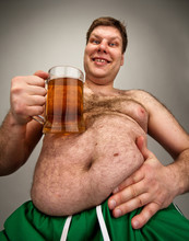 Funny Fat Man With Glass Of Beer