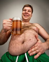 Funny fat man with glass of beer