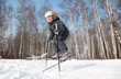 © Pavel Losevsky - Young boy jumps sideways with cross-country skis