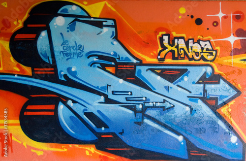 Obraz na płótnie canvas czteroczęściowy "tetraptyk" Graffiti niebieski kontra pomarańczowy