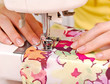 © Smart Future - Hand sewing on a machine