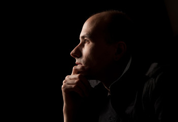 Wall Mural - Portrait of young man thinking