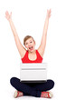 © pikselstock - Girl cheering with laptop