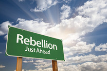Rebellion Green Road Sign And Clouds