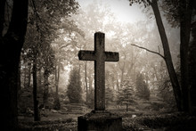 Cross In Fog At The Cemetary