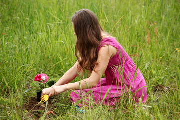 Wall Mural - girl grow flower