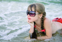 Little Girl On The Beach