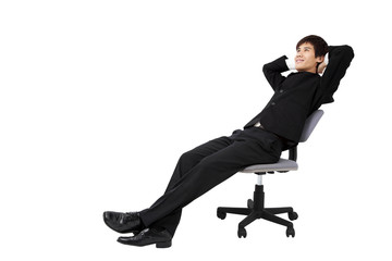 relaxed young businessman sitting on the chair